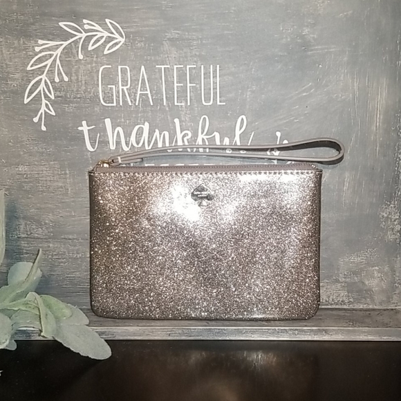 kate spade Handbags - Kate Spade Mavis Street Silver Glitter Wristlet